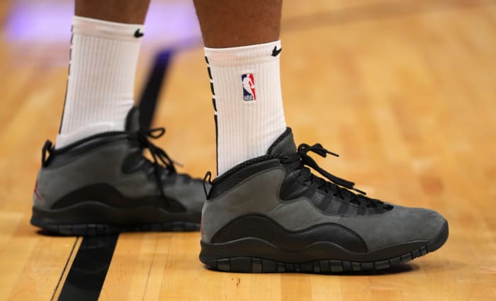 Miami Heat forward P.J. Tucker wears the Air Jordan 10 'Shadow' sneakers against the Memphis Grizzlies on December 6, 2021.
